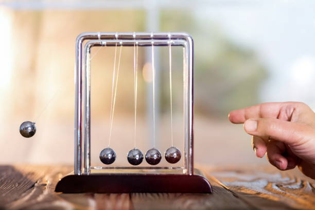 istock Concept For Action and Reaction in Business With Newton's Cradle 955962062