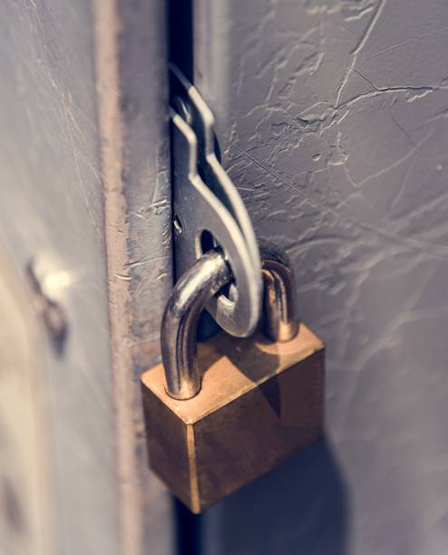 istock Closeup of a locked padlock 955962444