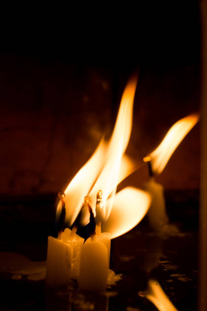 istock Burning candles give light in the dark 955978324