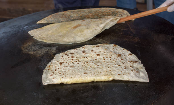 istock Making of traditional turkish gozleme pancake 955978358