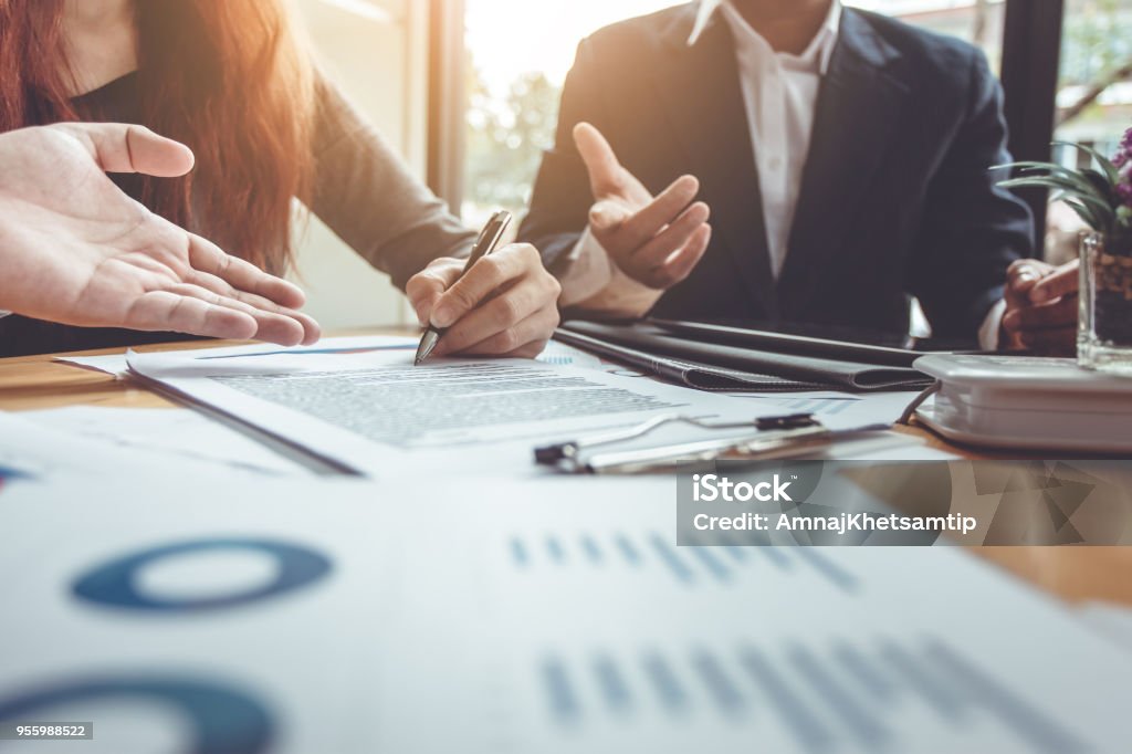 Business Signing a Contract Buy - sell house. Business Stock Photo