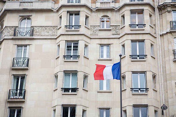 istock French apartment building with flag 95598920