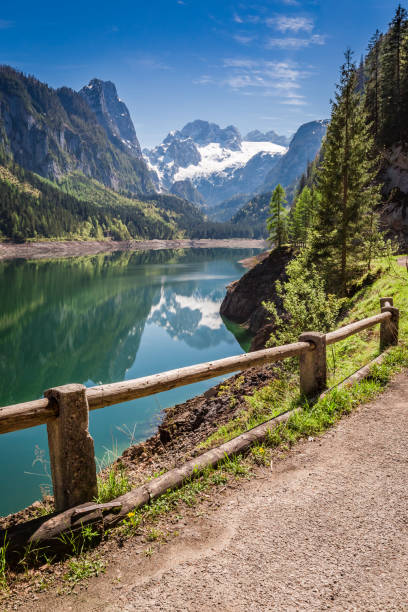 istock Beautiful spring at mountain lake in Gosau, Alps, Austria 955989668