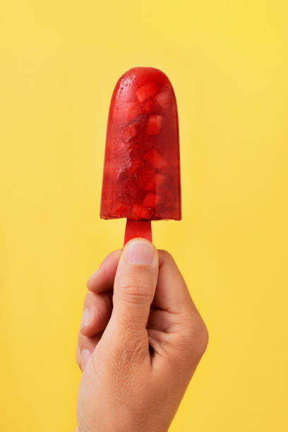istock man with a homemade ice pop in his hand 955994690
