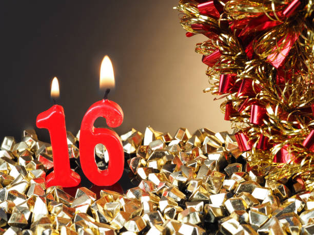 istock Birthday-anniversary candle showing Nr. 16 955997860