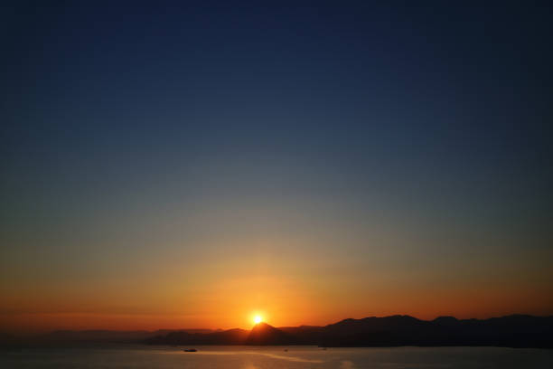 istock Golden sunset on the mountain coast 955997884