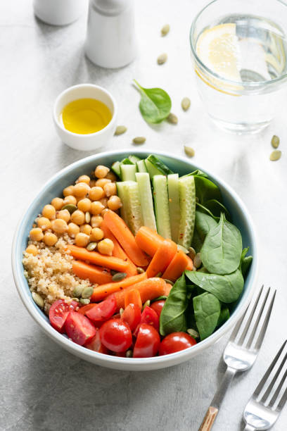 istock Nourishing buddha bowl on white table 955998726