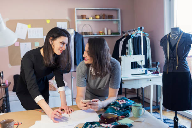 istock Fashion Designers Working In Their Art Studio 955998914