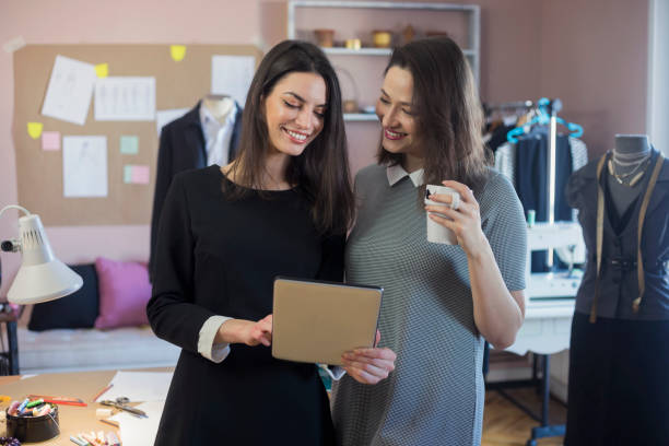 istock Fashion Designers Working In Their Art Studio 955999090