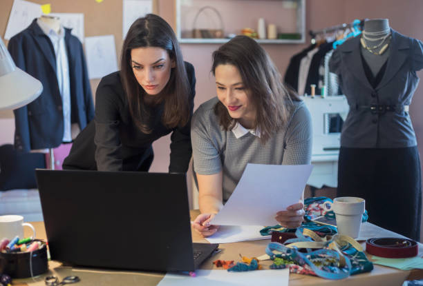 istock Fashion Designers Working In Their Art Studio 955999402
