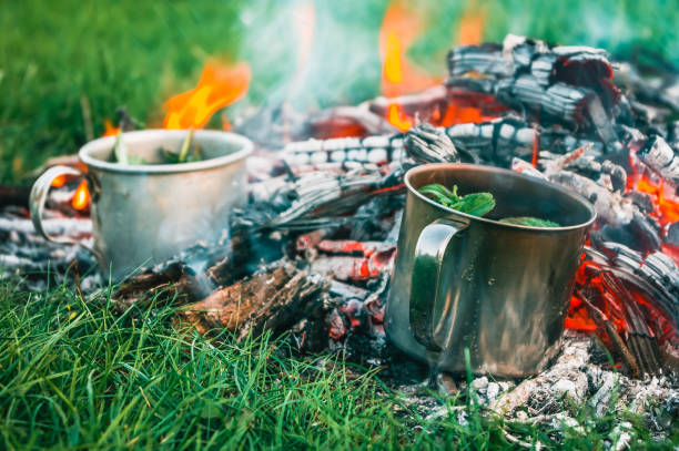 istock Mint tea prepared in cups on an open fire 956000172
