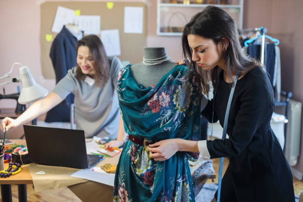 istock Fashion Designers Working In Their Art Studio 956000276