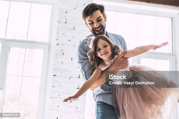 Dad With Daughter At Home Stock Photo - Download Image Now - Father, Daughter, Dancing