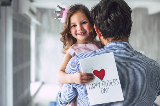 istock Dad with daughter at home 956003198