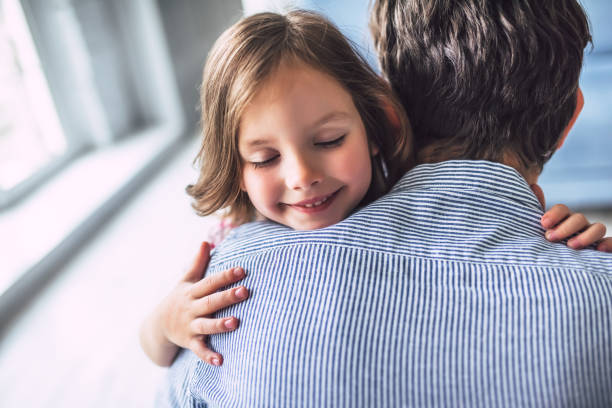 istock Dad with daughter at home 956003382