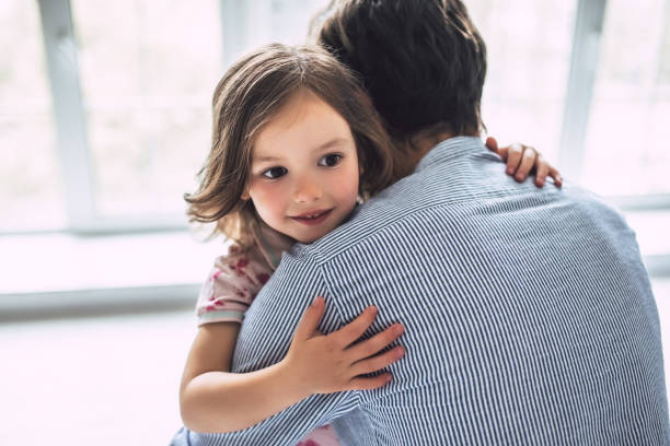 istock Dad with daughter at home 956003568