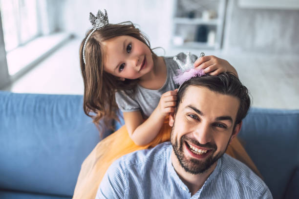 istock Dad with daughter at home 956003792