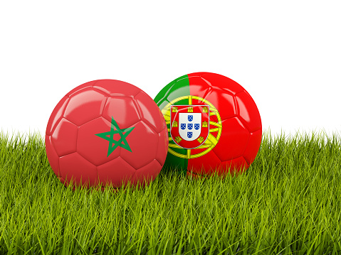 Morocco vs Portugal. Soccer concept. Footballs with flags on green grass. 3D illustration