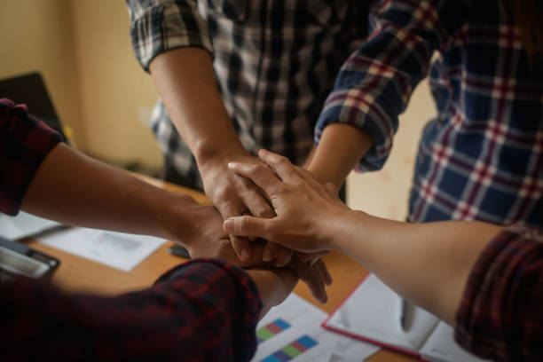 istock Business teamwork join hands together. Business teamwork success concept 956005386
