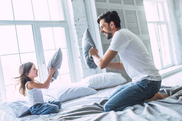 istock Dad with daughter at home 956008462