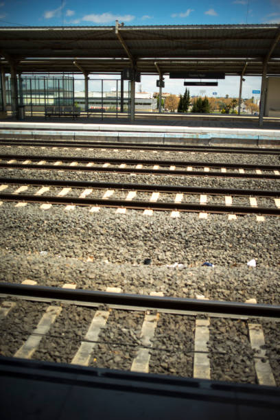 istock High speed modern electric train station platform tracks in Spain. 956012638
