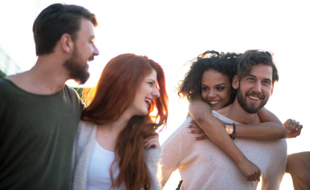 istock Smiling group of friends 956013634