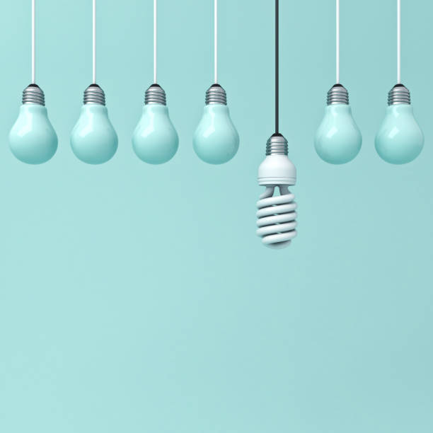 istock One hanging eco energy saving light bulb standing out from unlit light bulbs on green pastel color background , leadership and different creative idea concepts . 3D rendering 956014422