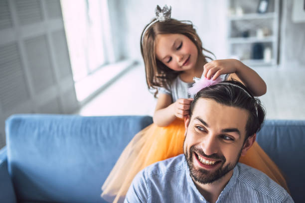 istock Dad with daughter at home 956015168