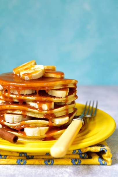 istock Banana pancakes with caramel 956015284