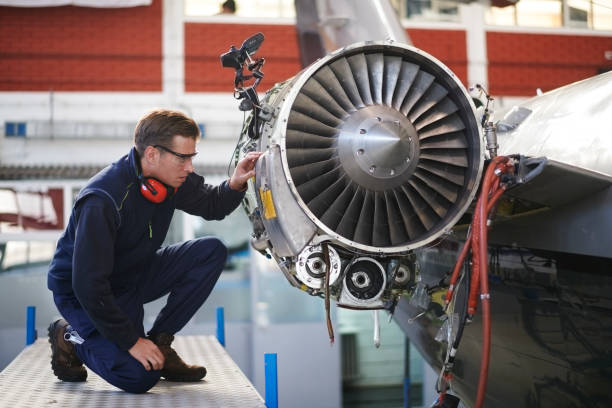 istock Aircraft mechanic in the hangar 956019742