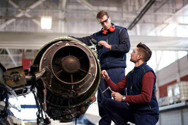 istock Aircraft mechanics in the hangar 956019846