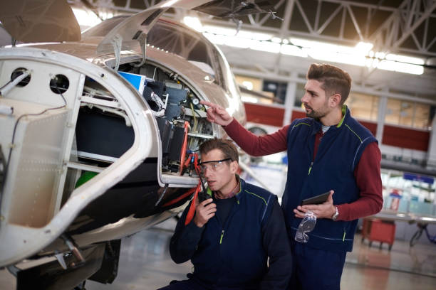istock Aircraft mechanics in the hangar 956020158
