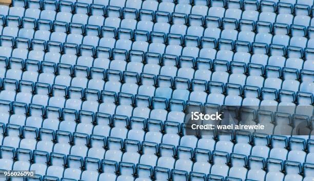 Rows Of Blue Plastic Stadium Seats Stock Photo - Download Image Now - Architecture, Bench, Blue