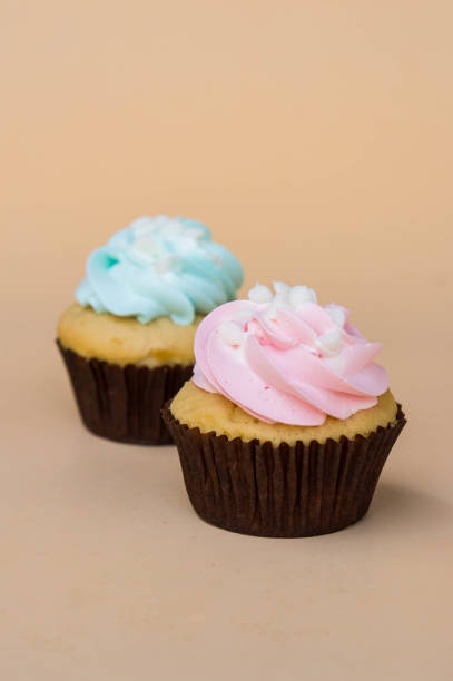 istock sweet cup cake dessert on yellow background and copy space 956031056