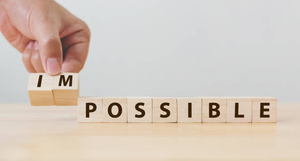 istock Hand flip wooden cube with word impossible to possible, Personal development and career growth or change yourself concept 956031336