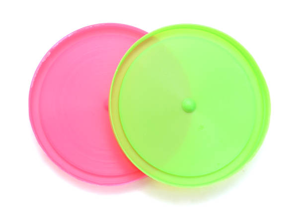 istock Colorful plastic lids for jars isolated on white background 956035038