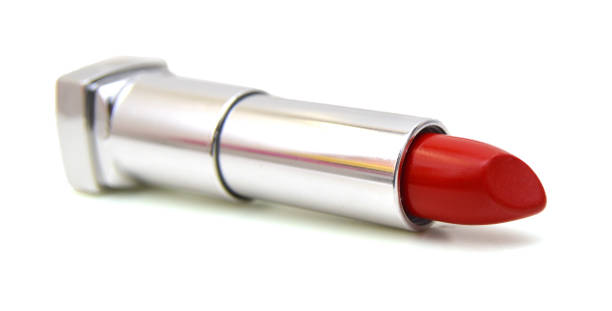 istock close up of a lipstick on white background 956035290