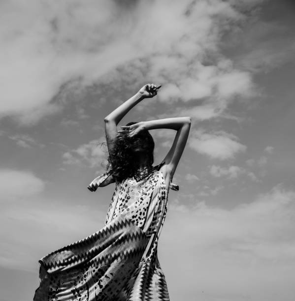 istock young woman enjoying her day under the sunlight 956045392