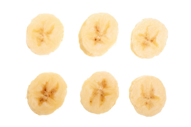 istock banana sliced isolated on white background. Top view. Flat lay 956045788