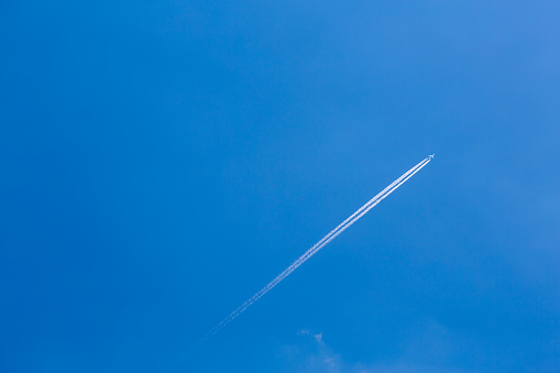 Blue sky and airplane cloud