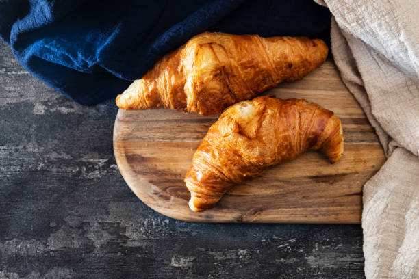 istock fresh croissant on table ,Delicious! 956050508