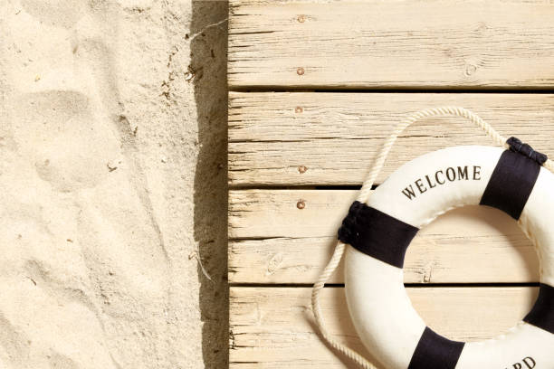 istock Life buoy on the beach 956050718
