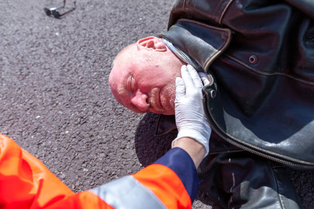 istock A german paramedic check blood pressure on an injured biker 956050898