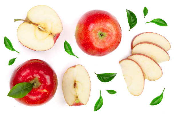 istock red apples with slices and leaves isolated on white background top view. Set or collection. Flat lay pattern 956050970
