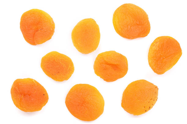 istock Dried apricots isolated on a white background. Top view. Flat lay pattern 956050986