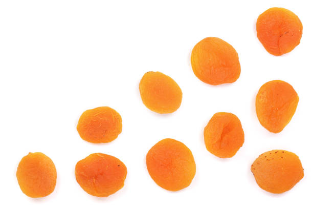 istock Dried apricots isolated on a white background with copy space for your text. Top view. Flat lay pattern 956051000