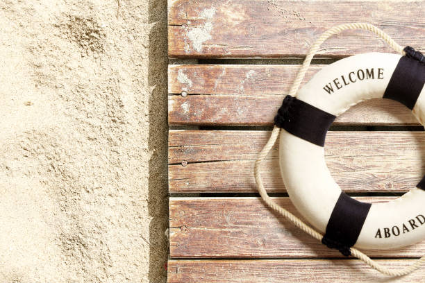 istock Life buoy on the beach 956051388