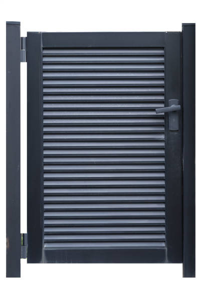 istock Black metal door isolated on white background 956052492
