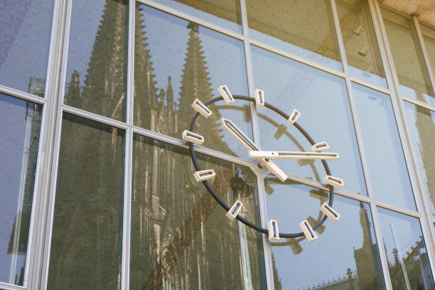 Station Clock with reflecting Cologne Cathedral Towers