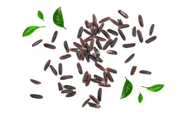 istock Black wild rice isolated on white background close up. Top view. Flat lay 956053150